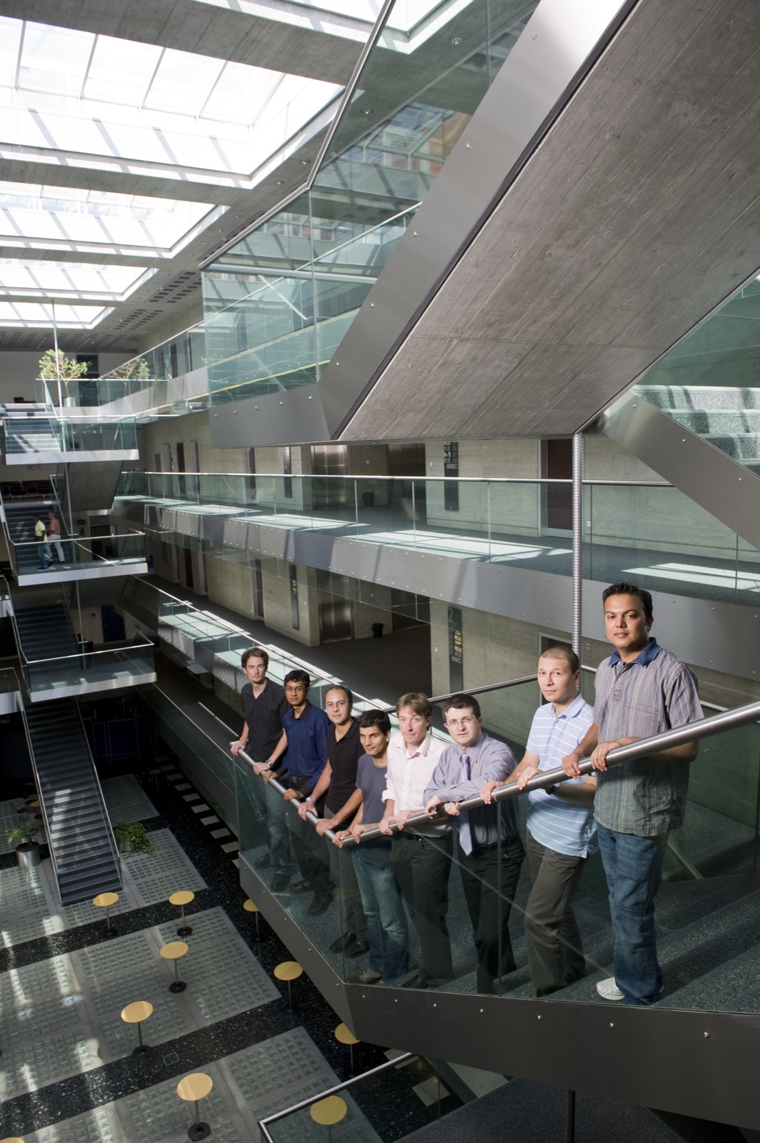 The Biometrics Group on a walkway in the Idiap atrium
