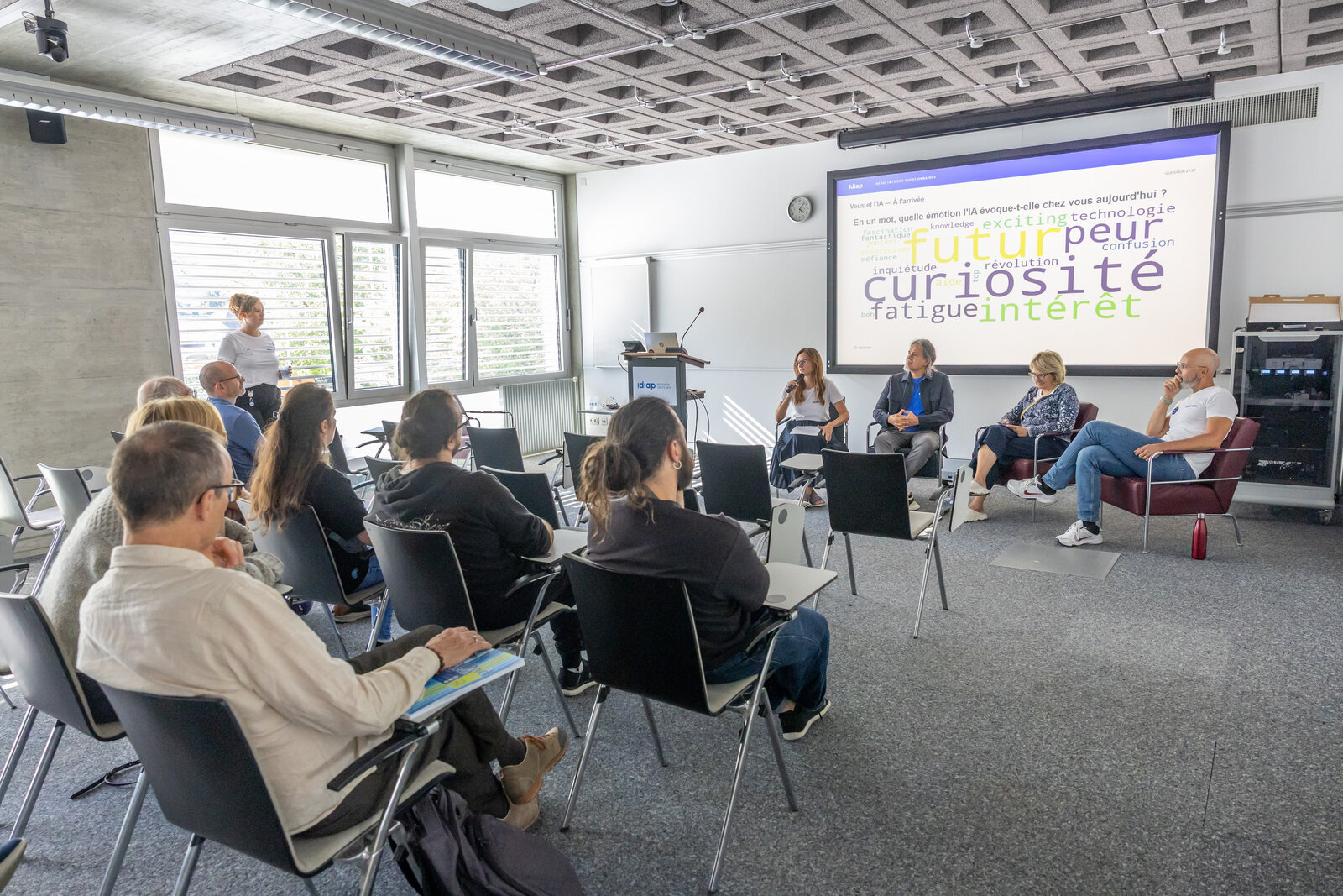 The audience and panel discussing artificial intelligence