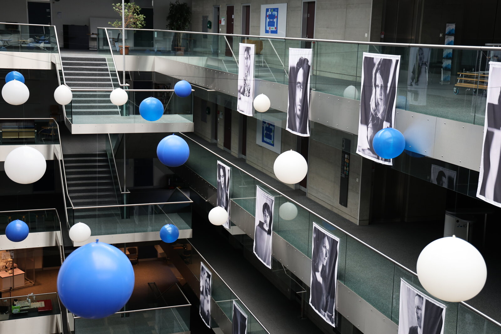A view across the decorated Idiap atrium